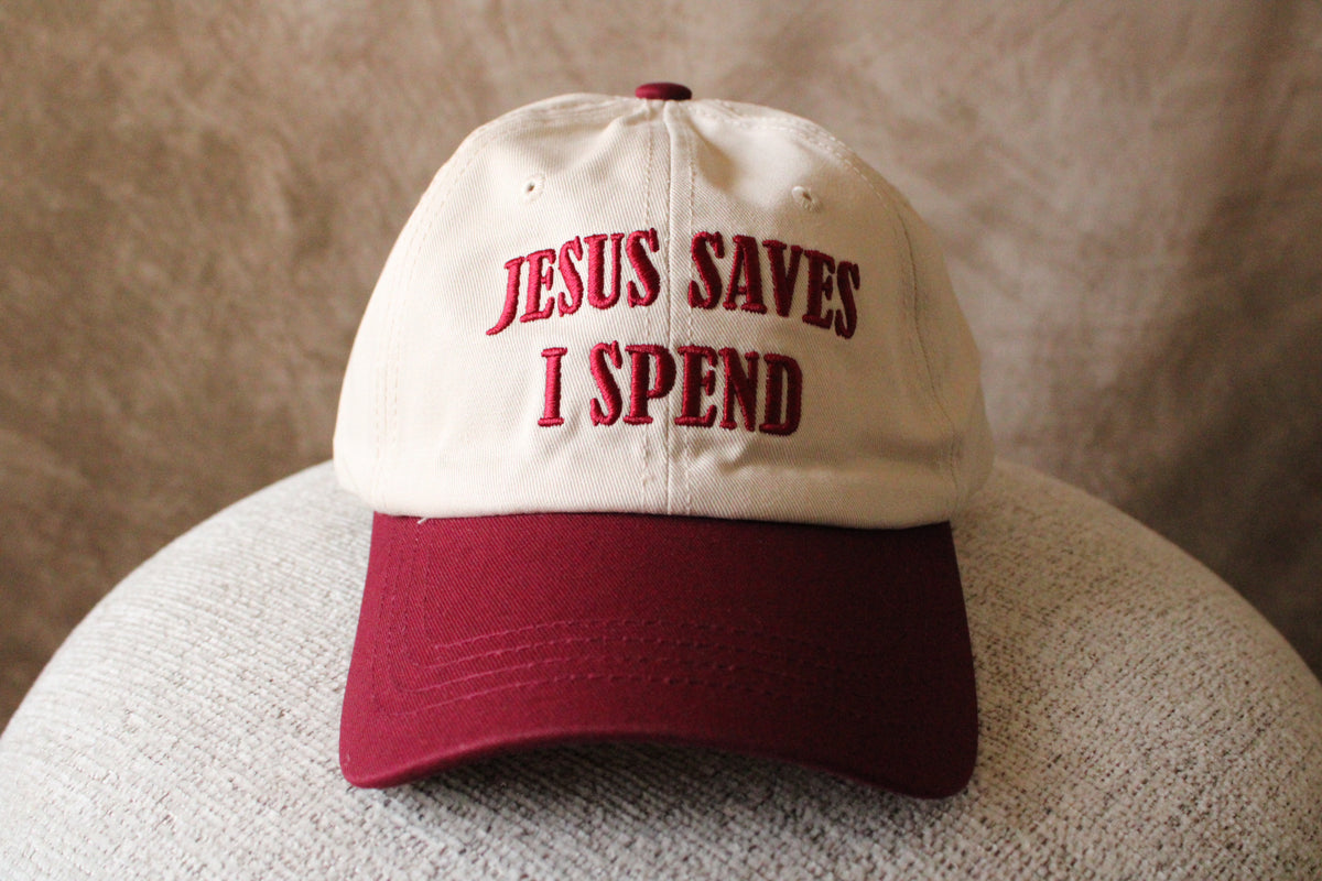‘Jesus Saves, I Spend’ Trucker Hat