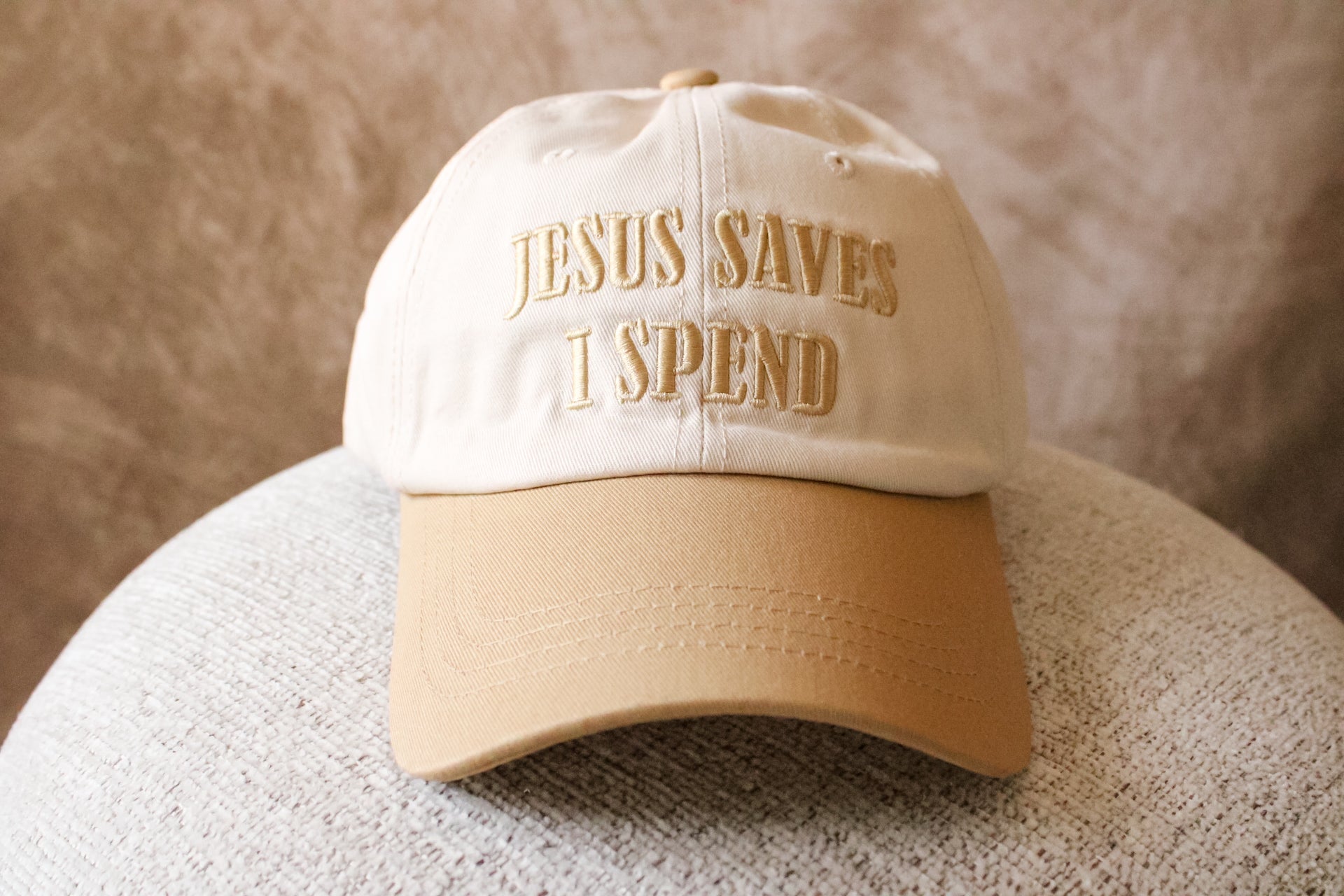 ‘Jesus Saves, I Spend’ Trucker Hat